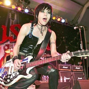 joanjett Joan Jett sporting her signature leather vest.